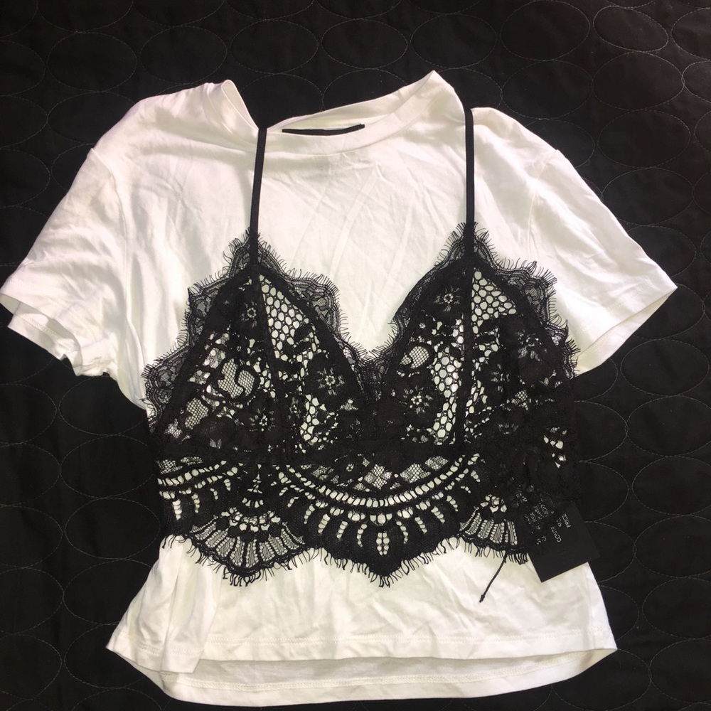 white short top with black brallete on top